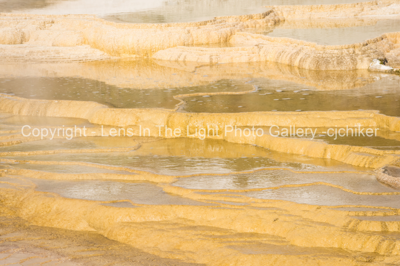 Travertine-Mineral-Pools-At-Mammoth-Hot-Springs-In-Yellowstone-National-Park