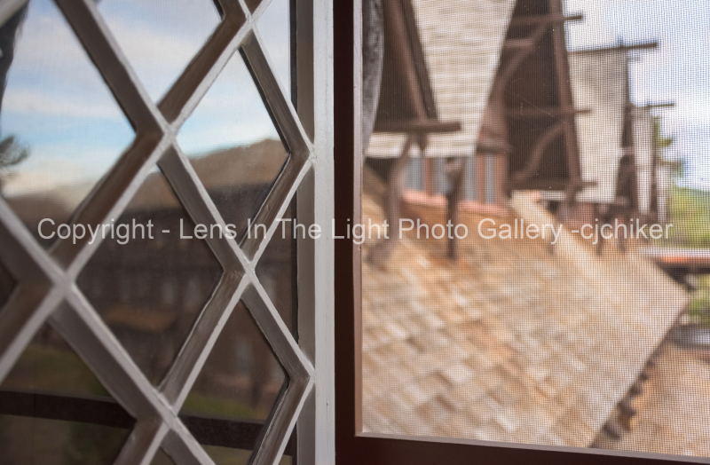 Window-Pane-View-Old-Faithful-Inn-Yellowstone-National-Park