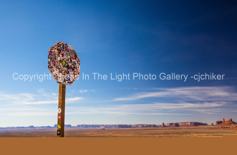 Stop-Sign-Stickers-Graffiti-Monument-Valley-Utah-Iconic-Highway